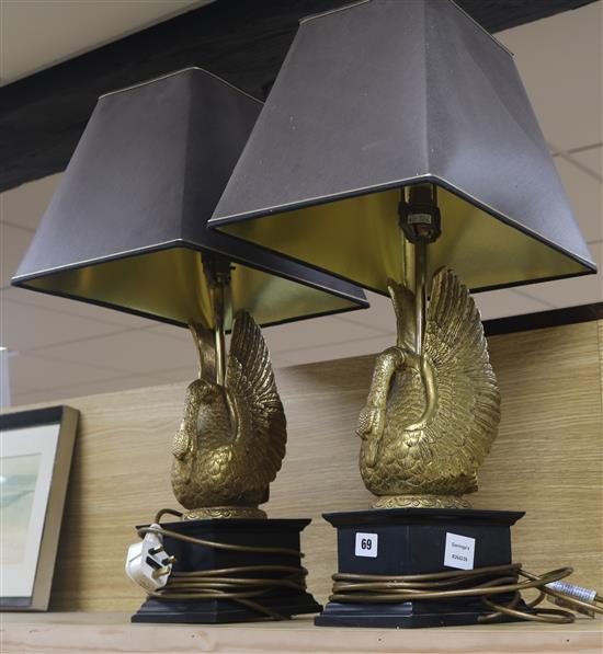 A pair of gilt composition swan table lamps